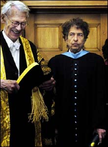 Sir Kenneth Dover, left, with Bob Dylan