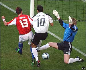 The Czech Republic's Martin Jiranek and Germany's Bernd Schneider and Oliver Kahn