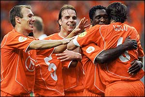 Holland's players celebrate after Van Nistelrooy scores his second