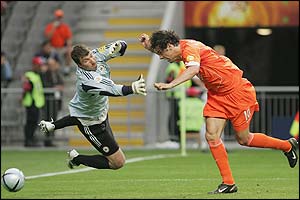 Ruud van Nistelrooy stoops to score his second goal 