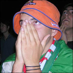 A Portuguese fan can hardly bear to watch