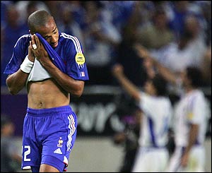 Thierry Henry wipes a tear as the final whistle is blown