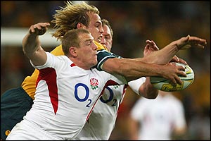 Mike Tindall of England and Phil Waugh of the Wallabies fight for possession