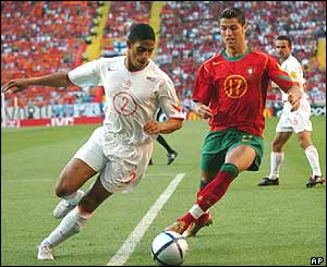Dutch defender Michael Reiziger and Portuguese forward Cristiano Ronaldo