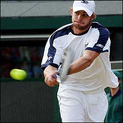 The players have to leave the court yet again as the rain comes down for the second time