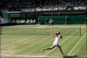 The two players take part in a rally