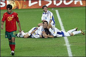 The final whistle is blown signalling dramatic celebrations from Greek players