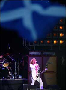 Justin from The Darkness, Saturday's headline act