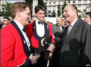 UK troops (left) meet Jacques Chirac