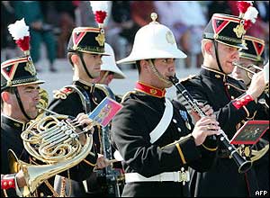 Musicians. Royal Marine in white helmet