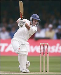 Andrew Strauss adds some runs to England's total on day one of the first Test