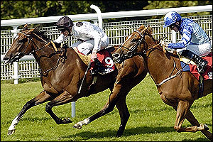 Soviet Song wins the 3.55 at Goodwood