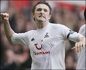 Irish striker Robbie Keane levels the scores late in the first half