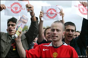 Manchester United fans show their feelings about a possible takeover of the club