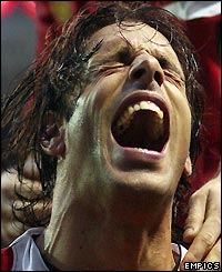 Ruud van Nistelrooy celebrates scoring a penalty