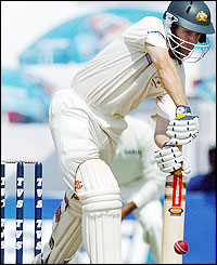 Katich reaches 54 from 93 balls before the tea-break