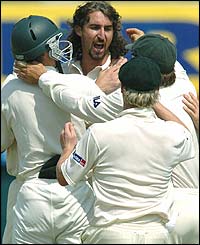 Jason Gillespie celebrates removing Aakash Chopra