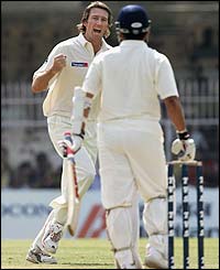 Glenn McGrath claims the vital wicket of Sachin Tendulkar
