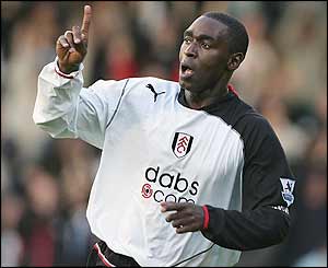 Andy Cole celebrates scoring for Fulham