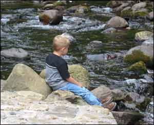 Sean Jenkins from Michigan on holiday in Wales, by the river Twrch at Cwmtwrch (Photo by his grandfather Rhys Jenkins)