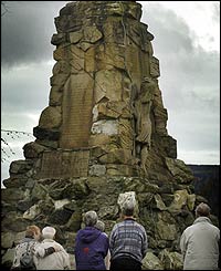 Visitors to the Black Watch memorial at Aberfeldy, near Perth, a two-minute silence at 1100 GMT.
