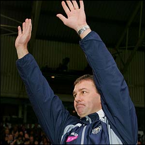 Bryan Robson greets the crowd