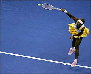 Serena Williams serves to Maria Sharapova