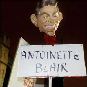 Protestester's mask of Tony Blair