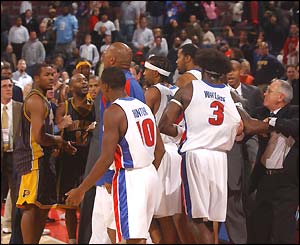 Detroit's Ben Wallace is held back from a scuffle