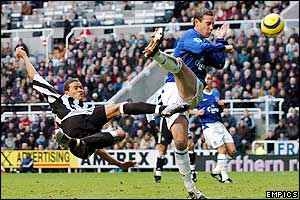 Jermaine Jenas has an acrobatic shot on goal but it rebounds off the crossbar