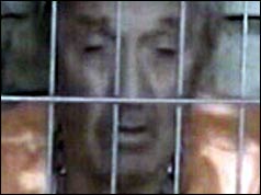 Ken Bigley behind bars 