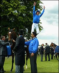 Frankie Dettori does a flying dismount at Royal Ascot
