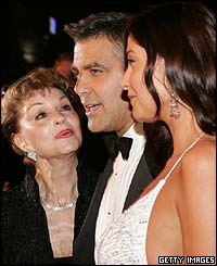 George Clooney (centre) with his mum (left) and Lisa Snowdon (right)