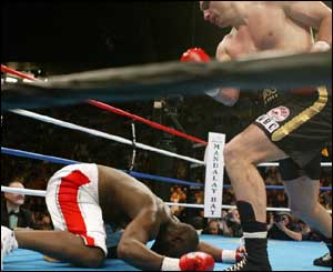 Despite showing tremendous heart, Williams ends up on the canvas for a third time. . . and a fourth