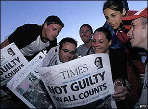 Fans read newspapers outside Neverland ranch