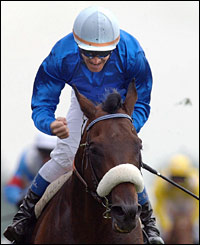 Oliver Peslier celebrates his Gold Cup win