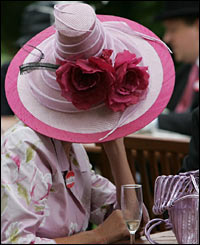 A woman enjoys a pre-race drink