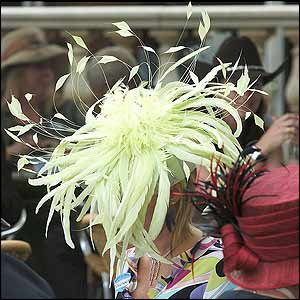 A racegoer sports a novel hat