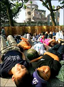 Children stage a protest outside the Atomic Bomb Dome