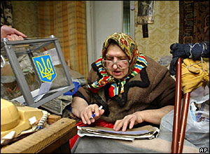 Elderly woman voting at home