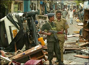 Sri Lankan troops patrol Galle in southern Sri Lanka, one of the worse areas hit by the sea surges