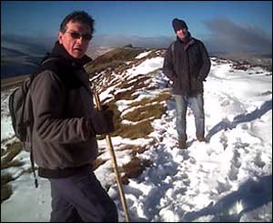 Walkers in the snow on the ridge above the Llantony valley (Les Taylor)