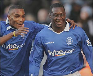 Morrison celebrates with Heskey