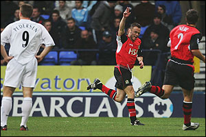 Paul Dickov of Blackburn celebrates his goal