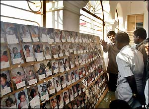 Photos of unidentified victims at a church in Galle, Sri Lanka
