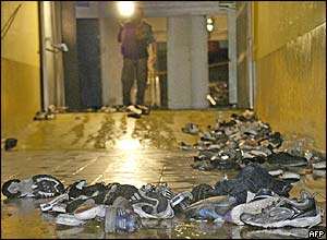Abandoned shoes line a corridor in the nightclub in Buenos Aires