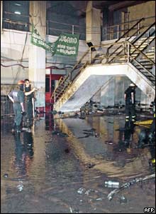 Fire inspectors inside the burned-out nightclub in Buenos Aires