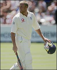 Flintoff returns to the pavilion after his dismissal