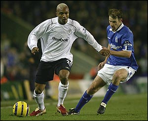 El Hadji Diouf evades the attentions of Birmingham's Kenny Cunningham 