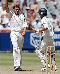 Steve Harmison claims his first wicket of the match